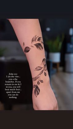 a woman's foot with leaves on it and a quote from the book, i am