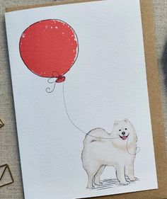 a card with a white dog holding a red balloon