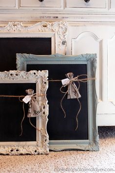 two old frames with twine bows tied to them