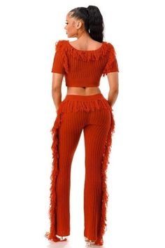 Elevate your style with our "Lets Dance Fringe Set," a captivating ensemble that seamlessly blends comfort and chic. Meticulously crafted, this set is designed to make a bold statement and leave a lasting impression.Key Features:1. Fabric: Indulge in the luxurious feel of our cable knit pants set, expertly crafted from 100% polyester for a cozy and stylish experience.2. Fit: The set includes cable knit pants and a short sleeve fringe crop top for a trendy and coordinated look.3. Color Options: O Cable Knit Pants, Fringe Pants, Fringe Crop Top, Crop Top Set, Let's Dance, Fringe Sweater, Top And Pants Set, Activewear Sets, Lets Dance