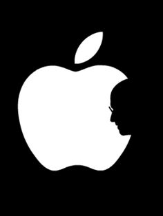 an apple logo is shown in the dark with a man's face on it