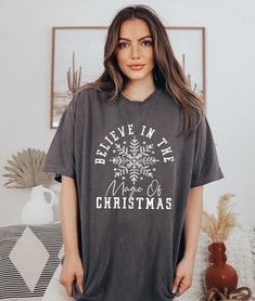 Magic of Christmas T-Shirt, Christmas T-Shirt, Holiday Shirt, Winter Shirt, Merry Christmas Shirt, Gift for Her, Xmas Tee, Comfort Colors ❤Welcome to Capellaa Designs,  If you are looking for clothes that suit your pleasure, you are in the right place! I would really like to offer you the best products. I love my job and are happy to offer you quality products. If you have any questions, concerns or requests regarding my products, feel free to ask me. This is my job and you can be sure that we will get back to you as soon as possible. ❤Sizing and Coloring When choosing the product, please pay attention to the size and color. In this way, I can deliver it to you in a shorter time. ❤Product Details Unisex T-Shirt: - Comfort Colors Brand -100% cotton ❤Shipping  After placing your order, you c Christmas Short Sleeve Relaxed Fit Tops, Christmas Relaxed Fit Short Sleeve Tops, Relaxed Fit Graphic Tee For Christmas, Relaxed Fit Short Sleeve Christmas Tops, Christmas Letter Print Short Sleeve Tops, Relaxed Fit Christmas T-shirt For Holiday, Christmas Graphic Tee With Relaxed Fit, Relaxed Fit Crew Neck T-shirt For Christmas, Products I Love