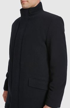 A loose car coat fashioned from a durable wool blend features a stand collar and a sleek snap storm placket added warmth and comfort. 33 1/2" length (size Medium) Front zip closure with snap storm placket Stand collar Long sleeves Front flap pockets Lined 60% wool, 30% polyester, 5% acrylic, 5% other fibers Dry clean Made in China Solid Funnel Neck Outerwear For Fall, Winter Business Outerwear With Stand Collar, Stand Collar Outerwear For Business In Winter, Solid Funnel Neck Outerwear For Work, Black Wool Outerwear With Stand Collar, Classic Outerwear With Stand Collar And Button Closure, Wool Outerwear With Stand Collar For Winter, Winter Sport Coat With Stand Collar For Work, Winter Workwear Sport Coat With Stand Collar