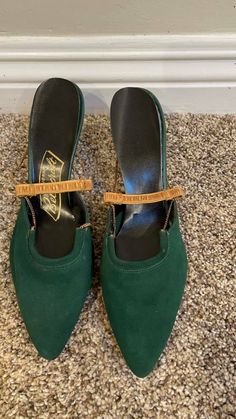 1950’s 1960’s green suede heels shoes with gold chains! National Bellecraft Never worn! There is a weird discoloration on the sole of one, and the inserts need regluing... There is an elastic strap that goes behind your foot, it’s still tight! No size indicated There are a few smallish white spots on one, not sure if they will wipe off... From heel to toe 9.25” Green Suede, Heels Shoes, Suede Heels, Gold Chains, Shoes Heels, Elastic, Chain, Heels, Green