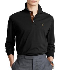 From Polo Ralph Lauren&#x2C; this shirt features:ribbed polo collarlong sleeves with ribbed cuffsthree-button placketmulticolored signature embroidered Pony at the left chestfaux-suede facingeven vented hemcottonmachine washImported. Work Polo Shirt With Button Cuffs, Workwear Polo Shirt With Button Cuffs, Black Polo Collar Sweater For Work, Workwear Polo Shirt With Ribbed Cuffs, Polo Shirt With Ribbed Cuffs For Workwear, Black Long Sleeve Polo Sweater With Button Closure, Black Polo Sweater With Ribbed Cuffs, Black Collared Top With Ribbed Cuffs, Long Sleeve Polo Shirt For Fall With Button Closure