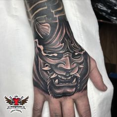 Dope hand piece from Ben Carlisle made using #magnumtattoosupplies 👊🏻 . . #blackandgrey #tattoo #blackandgreytattoo #tattoos #ink #inked #tattooartist #art #tattooart #tattooed #tattoolife #realistictattoo #blackwork #realism #artist #tattooideas Instagram: ben_carlisle_tattooist 👈🏻 Japan Hand Tattoo, Hand Tattoos For Men Ideas Design, Chinese Hand Tattoos, Oni Mask Hand Tattoo, Samurai Hand Tattoo, Devil Hand Tattoo, Cover Up Hand Tattoos, Oni Demon Tattoo