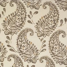 a white and brown paisley print fabric