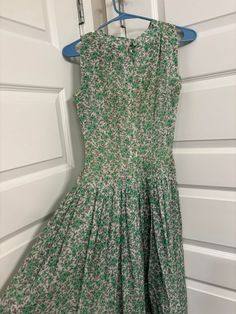 Vintage 1950's chiffon green dress in beautiful condition. Free of stains, tears or snags. Has a perfectly functional zipper. Dress would need to have a slip worn beneath it.  B:14 W: 12 H:Free 1950s Style Green A-line Dress, Green Fitted Sleeveless Vintage Dress, Green Lined Vintage Dress, Vintage Green Pleated Dress, 1950s Style Sleeveless Green Dress, 1950s Style Green Vintage Dress For Spring, 1950s Style Green Lined Dress, Vintage Green Dress For Garden Party, Retro Green Lined Vintage Dress