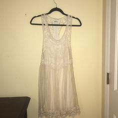 Gorgeous Cream Dress From Hollister! Nwot And Comes From A Smoke Free Home. Casual Sleeveless Sheer Dress, Casual Sheer Sleeveless Dress, Casual Cream Lace Mini Dress, Bohemian Sheer Mini Dress For Spring, Casual Sheer Mini Dress, White Sheer Dress For Day Out, Sundress With Lace Trim, Casual Sheer Midi-length Dresses, Casual Sheer Dress For Day Out