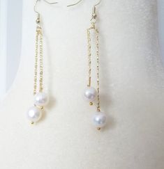 "An modern style white Akoya 9-10 mm pearl earrings, the earrings are 3\" long set in 14k gold plated vermeil french hook ear wires and chain, monitor colors may vary slightly, please add your phone number to ensure efficient delivery, this will only be  used for shipping purposes, packages with phone numbers will clear customs more speedily, thank you" Hypoallergenic Pearl Jewelry For Parties, Pearl White Akoya Pearl Dangle Earrings, Akoya Pearl Dangle Earrings In Pearl White, Akoya Pearl White Dangle Earrings, Akoya Pearl Dangle Earrings, Gift Akoya Pearl Dangle Earrings, Akoya Pearl Dangle Earrings For Anniversary, Akoya Pearl Dangle Earrings Gift, Dangle Akoya Pearl Earrings For Gift