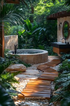 an outdoor bathtub surrounded by greenery and stone steps leading up to the tub