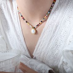 Style: Female Material: Titanium Steel, Faceted Abacus Beads Zircon, Mother of Pearl Pearl Type: Cultured Pearl Color: White Necklace Length: 42+5cm Pendant Size: 1.5cm White Bohemian Beaded Necklaces With Clavicle Chain, Adjustable Clavicle Chain Necklace With Round Beads, Colorful Beaded Pendant Jewelry, White Necklaces With Tiny Round Beads, White Necklaces With Tiny Beads, White Beaded Pendant Crystal Necklace, White Oval Beaded Chain Jewelry, White Round Necklaces With Tiny Beads, Silver Beaded Necklaces With Colorful Beads