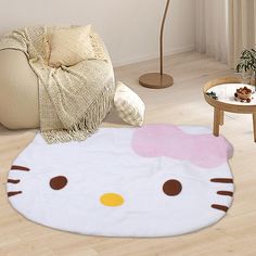 a hello kitty rug in the middle of a living room