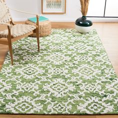 a green and white rug in a living room