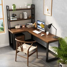 a computer desk with a chair and bookshelf in the corner next to it