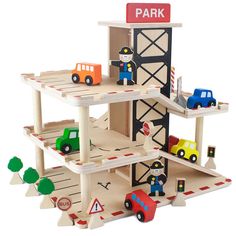 a wooden toy set with cars and trucks