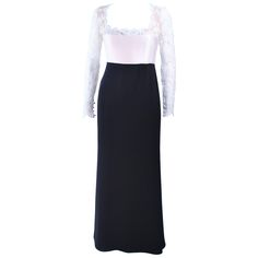 This Carolina Herrera design is composed of a white lace bodice, with top-stitched satin waist, and black skirt. There is a center back zipper with buttons. In excellent vintage condition. **Please cross-reference measurements for personal accuracy. Size in description box is an estimation. Measures (Approximately) Length: 56" Sleeve: 25" Shoulder to shoulder: 14" Bust: 32" Waist: 28.5" Hip: 38" White Lace Gown, Cross Reference, Diy Keychain, Lace Bodice, Lace Gown, Carolina Herrera, Badgley Mischka, Black Skirt, Evening Dress