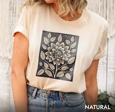 Bold black floral print on a boho cottagecore t-shirt for the girl who's both feminine and fierce. Hi there! We use high-quality t-shirt brands such as Bella&Canvas and Gildan Soft style. Oh! Let me tell you how soft, cozy, and comfy our t-shirts areNot to mention Bella&Canvas is an eco-friendly brand and Gildan Soft style uses eco-friendly materials️ You are more than welcome to specify which brand you would prefer at the checkout ☺️☺️ Here is some more information about t-shirts  ✓ All of our solid colors are 100% cotton ✓ All heather colors are polycotton mix which makes them feel extra soft😍😍 ✓ Our t-shirts are Unisex and size charts are available on the listing photos. 👕👚 ✓ Don't worry tag labels are easy to tear off 🔖So you don't have to worry about that unwanted itching anymore Group Cruise Shirts, Neutral T Shirts, T Shirt Flowers, Floral Tee, Flower Shirt, Comfort Colors Tee, Bold Black, Floral Shirt, The Girl Who