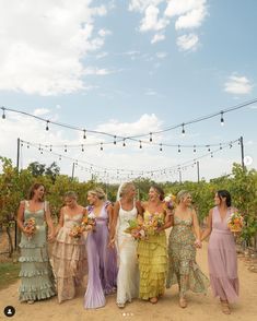 a group of women standing next to each other