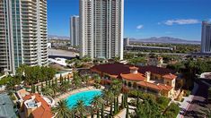 an aerial view of the pool and surrounding buildings in las vegas, nv on a sunny day