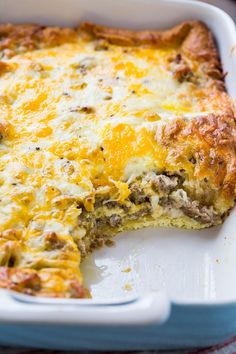 a casserole dish with meat and cheese in it