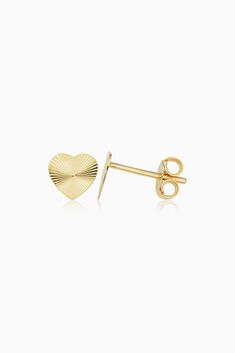 Our diamond-cut Heartthrob Studs radiate desire. Cute, classic heart shapes are crafted from solid gold with texturized ridges that give off an art deco appeal. Metal: 14k Yellow Gold Construction: Push Back Closure Dimensions: 6.5mm Tall, 7mm Wide Weight: 0.7 Grams Solid Gold Origin: Crafted in Vicenza, Italy Gold Heart Earrings Diamond Cut Gift, 14k Gold Diamond Cut Heart Earrings, 14k Gold Diamond Cut Heart Earrings For Anniversary, Valentine's Day Yellow Gold Heart Earrings With Diamond Cut, Anniversary Yellow Gold Diamond Cut Heart Earrings, 14k Yellow Gold Heart Earrings With Diamond Cut, 14k Gold Heart Earrings With Diamond Cut, Classic Diamond-cut Heart Earrings For Valentine's Day, Formal 14k Yellow Gold Heart Earrings