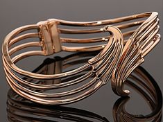 Timna Jewelry Collection ™ copper hinged cuff bracelet. Measures approximately 1/2"W. No clasp. Elegant Bronze Bangle Bracelet, Elegant Silver-colored Copper Bracelets, Elegant Bronze Bracelets, Elegant Rose Gold Copper Bangle, Elegant Bronze Metal Cuff Bracelet, Elegant Silver-colored Copper Cuff Bracelet, Elegant Gold Copper Cuff Bracelet, Elegant Gold-colored Copper Bracelets, Elegant Gold-colored Copper Bracelet