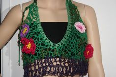 Ready To Ship ~  Beautiful Romantic Nature Forest Fairy top!  Freeform crochet and hand knitted top.  Made from my hand spun art yarn. I embellished the top with crochet flowers. Unique. One Of A Kind Wearable Art. Makes a lovely gift! Comes wrapped gift!  Green and purple tones. With crochet flowers. This top ties up at the back with long green cords. It is light, airy and lacey.  You will be the only one in the world to wear this hand made freeform crochet and hand knitted top! Each item that Boho Nature, Romantic Nature, Tie Up Top, Fairy Top, Flowers Unique, Spin Art, Purple Tones, Art Yarn, Nature Forest