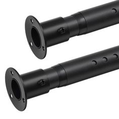 two black metal tubes with holes on them