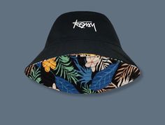 Unisex Reversible Bucket Hat available in different colors and sizes. This stylish pattern bucket hat will be everything you need to elevate your style! Key Characteristics: Material: Cotton Size: Brim 8 / Depth 9 Shipping: Guaranteed safe + secure checkout 100% money back guarantee Not sold in stores, limited quantity available Casual Black Bucket Hat For Festivals, Casual Reversible Hat For Festivals, Casual Reversible Bucket Hat For Festival, Trendy Black Reversible Bucket Hat, Reversible Black Bucket Hat For Spring, Casual Reversible Bucket Hat For Vacation, Trendy Reversible Outdoor Hats, Black Reversible Hat For Streetwear, Reversible Black Bucket Hat For Beach