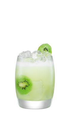 a green drink with kiwi slices on the rim