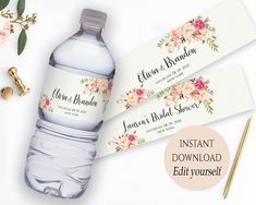 water bottle labels with flowers on them next to a pair of scissors and some other items