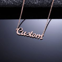 This exquisitely created Custom Name Fashion Necklace Gift adds a unique touch to your jewelry collection. The word, which can be the wearer's name or a particular word of their choice, is displayed on the necklace in an exquisite, cursive font. This piece can be worn every day as a signature accessory because it is attached to a similar delicate yet sturdy chain. Because of the chain's adjustable clasp, you can find the ideal length for every neckline. Features: Tailored Craftsmanship: Each Nam Name Necklace Silver, Cursive Font, Special Words, Word Up, Personalized Pendant, Custom Name Necklace, Steel Design, Elegant Necklaces, Rose Gold Necklace