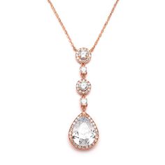 a necklace with three diamonds on it