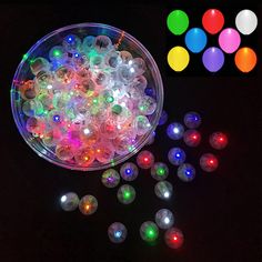 glow in the dark beads are shown on a black background with different colors and sizes