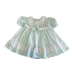 "Size: 6-9 Months Decade: 1980's Origin: Made in UK Condition: Excellent Materials: cotton and polyester, lined bodice * Shoulders: 8\" - 20cm * Bust: 10.5\" - 27cm * Length: 16\" - 40.5cm" Retro Dress With Ruffles And Doll Collar, 1950s Ruffled Vintage Dress For Spring, 1950s Vintage Summer Dress With Ruffles, 1950s Vintage Ruffled Dress For Summer, Retro Dress With Ruffles And Peter Pan Collar, 1950s Style Vintage Ruffled Dress For Summer, Retro Dress With Peter Pan Collar And Ruffles, Fitted Cotton Vintage Dress With Doll Collar, Vintage Cotton Ruffle Dress For Daywear