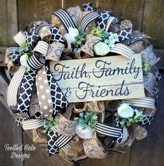 a wreath that says, faith family and friends