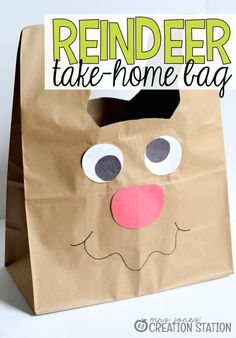 a brown paper bag with the words reindeer take - home egg on it and a face drawn