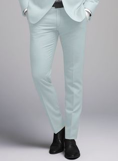 Infuse your style with confidence and poise in our Napoleon Pale Blue Wool Pants. Crafted with precision from a premium wool blend, these pants dazzles in a pale blue shade, showcasing a sleek solid pattern that defines luxury and comfort in every stitch. Perfectly suited for a range of events from joyous wedding celebrations to critical business meetings - this piece is designed to ensure you leave a lasting impact on any occasion.   Look Includes   Napolean Pale Blue Wool Fabric  Cross Pocket Elegant Blue Pants With Straight Hem, Fitted Classic Light Blue Bottoms, Fitted Light Blue Trousers, Elegant Light Blue Formal Bottoms, Light Blue Formal Pants For Spring, Fitted Light Blue Straight Pants, Fitted Light Blue Pants, Fitted Full-length Light Blue Pants, Fitted Full Length Light Blue Pants