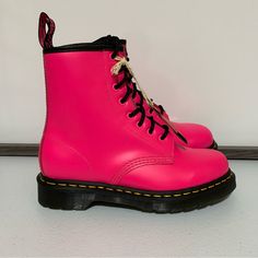 The Dr. Martens 1460 Clash Pink Smooth Leather Lace Up Boots -Size 6 (5 Men’s) -Clash Pink -Smooth Leather -Classic Doc's Dna Yellow Stitching, Grooved Sides, And Scripted Heel Loop -Full-Lace-Up Front -Pull Loop At Collar For Easy On And Off -Cushioned Insole -Air Cushion Outsole -Nwt -New Without Box *Last Picture Is A Stock Photo.* Pink Leather Moto Boots With Round Toe, Leather Lace Up Boots, Moto Boots, Lace Up Boots, Leather And Lace, Smooth Leather, Lace Up, Yellow, Women Shoes