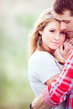 a man and woman embracing each other on an instagram