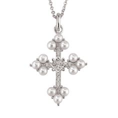 A beautiful symbol of faith, love and hope… This inspirational sterling silver cross pendant is a stylish way to keep your faith close to your heart! Classic and timeless cultured freshwater pearls are combined with a refined cross and shimmering simulated diamonds to create a truly elegant look. Comes complete with a sterling silver 18" chain and 2" extender. Silver Cross Necklace, Beautiful Symbols, Faith Love, Sterling Silver Cross Pendant, Silver Cross Pendant, Danbury Mint, Sterling Silver Cross, Freshwater Cultured Pearls, Religious Jewelry