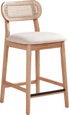 a wooden chair with a white upholstered seat and back cushion on an isolated white background