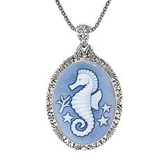 This beautifully intricate Samuel B. pendant boasts style that will set you soaring! Set in sterling silver  this pendant features an agate carved in your choice of a fine looking buddha  cat  moon  portrait  seahorse  turtle  butterfly  Virgin Mary or Jesus himself. All options boast a halo of textured scrollwork and 18K yellow gold accented halos as each swings from an included popcorn chain. Ornate Intaglio Necklace As Gift, Carved Pendant Necklace Collectible, Elegant Carved Agate Jewelry, Collectible Carved Pendant Necklace, Formal Carved Sterling Silver Necklace, Silver Intaglio Round Pendant Necklace, Silver Necklace With Intaglio Round Pendant, Silver Oval Intaglio Necklace, Oval Carved Silver Necklace