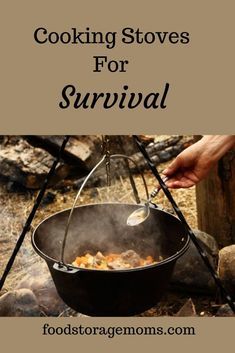 a person is cooking food on an outdoor campfire with a large pot and tongs