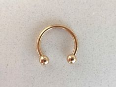 "Set of 3 Horseshoes Daith / Helix / Cartilage / Lip / Septum Piercings, Titanium, 16g 🎁 SPECIAL OFFER: You will receive 3 rings of your choice for the price of 2. If you want to order just one ring, please visit: https://www.etsy.com/shop/AnairdnaJewelry?section_id=28596774 HOW YOU CAN WEAR IT? ❖ daith earring ❖ helix earring ❖ cartilage earring ❖ septum horseshoe DIMENSIONS ❖ 16 gauge (1.2mm) ❖ inner diameter: 0.2\" (6mm) / 0.3\" (8mm) / 0.4\" (10mm) / 0.5\" (12mm) SPECIFICATIONS ❖ titanium p Horseshoe Septum Piercing, Horseshoe Septum, Piercing Daith, Septum Piercing Jewelry, Daith Earring, Earring Cartilage, Septum Piercings, Piercing Septum, Horseshoe Ring