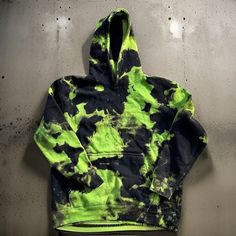 Hand dyed green and black Hoodie  . Gorgeous green and black Sweatshirt is extremely soft and made out the highest quality materials available. Unisex sizing so please see size guide in photos *does not have draw cords on hood Items are hand dyed so patterns will vary . Estimated processing time is 5 to 7 days . Message for rush orders  Washing instructions :  Wash on cold inside out  Do not use bleach  Tumble low  Wash by itself for the first few washes  Do not use liquid softener  Hoodie:  8 o Acid Wash Long Sleeve Hoodie In Grunge Style, Acid Wash Long Sleeve Grunge Hoodie, Grunge Long Sleeve Acid Wash Hoodie, Green Hooded Urban Sweatshirt, Urban Green Hooded Sweatshirt, Urban Green Cotton Hoodie, Tie Dye Hoodie Sweatshirt For Streetwear, Urban Green Sweatshirt For Streetwear, Tie Dye Sweatshirt For Streetwear