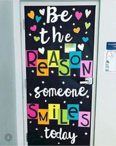 a door decorated with the words be the reason someone smiles today