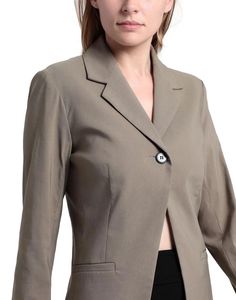 Elevate your wardrobe with our sophisticated and versatile Blazer. Crafted from a luxurious blend of 76% Viscose, 21% Polyamide, and 3% Elastane, this crepe blazer is designed to flatter your figure with precision-cut darts and a sleek, solid color finish. The classic lapel collar and single-breasted, one-button closure exude timeless elegance, while the addition of shoulder pads adds structure and polish to the silhouette. With its fully lined interior and multipockets, this blazer is as functional as it is fashionable, allowing you to carry all your essentials with ease. The stretch fabric ensures a comfortable fit and freedom of movement, making it perfect for all-day wear. At a length of 28.08 inches, this blazer strikes the perfect balance between professional and stylish, effortlessl Fitted Button-up Blazer Dress For Business Casual, Classic Button-up Blazer For Work, Career Blazer With Pockets, Tailored Button-up Blazer For Career, Classic Single-breasted Long Sleeve Blazer Dress, Classic Long Sleeve Single Breasted Blazer Dress, Tailored Solid Color Office Lady Blazer, Classic Long Sleeve Blazer Dress With Hidden Buttons, Classic Long Sleeve Blazer Dress With Hidden Button Closure