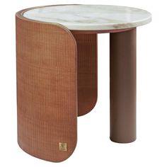 a round table with a marble top and metal legs